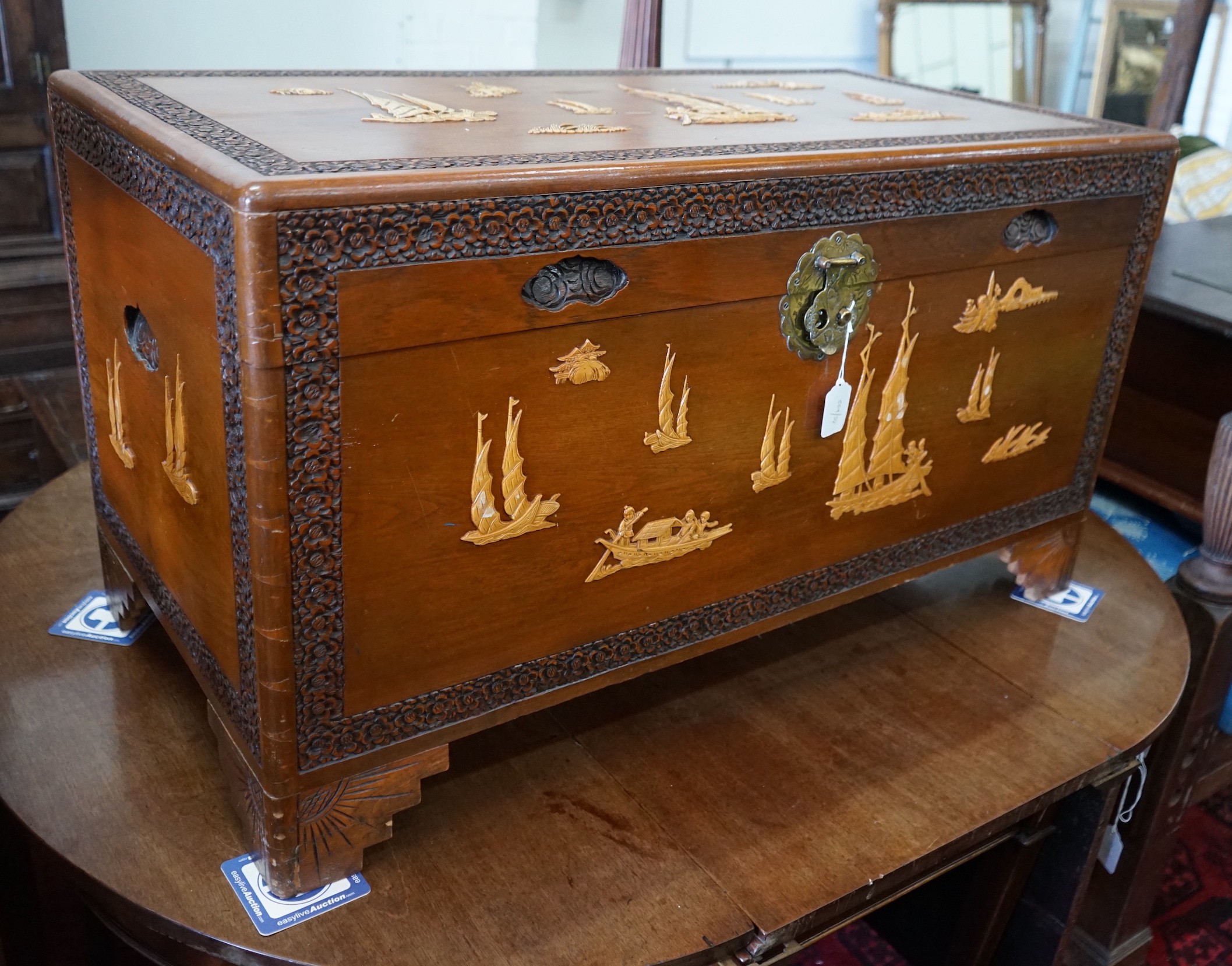 A Chinese camphorwood trunk, length 104cm, depth 53cm, height 58cm